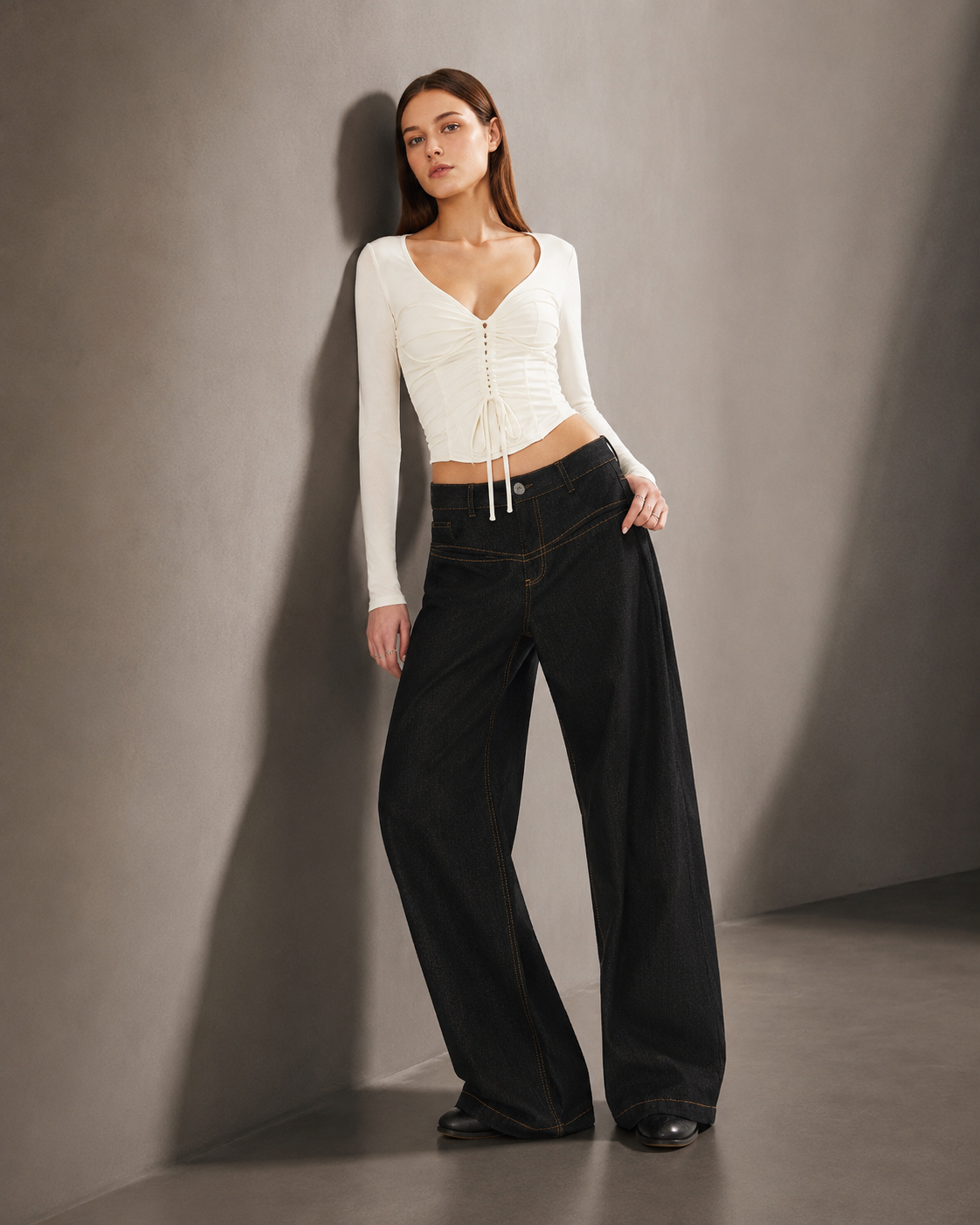 Black Low-Rise Scissor-Cut Jeans editorial model - Shop To Heaven