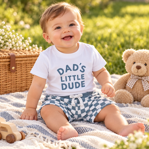White DAD'S LITTLE DUDE top and blue checked shorts editorial