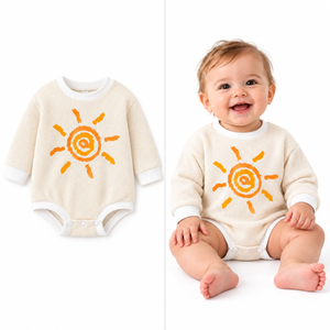 Beige sun print romper flat lay and baby modelling the same variant